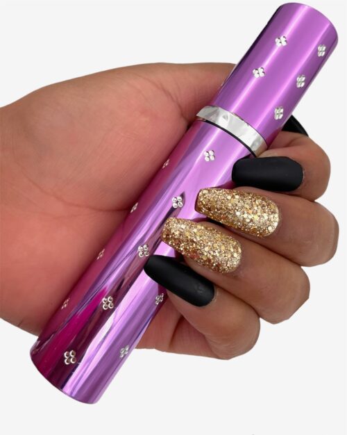 Panther Lipstick Stun Gun in hand - purple