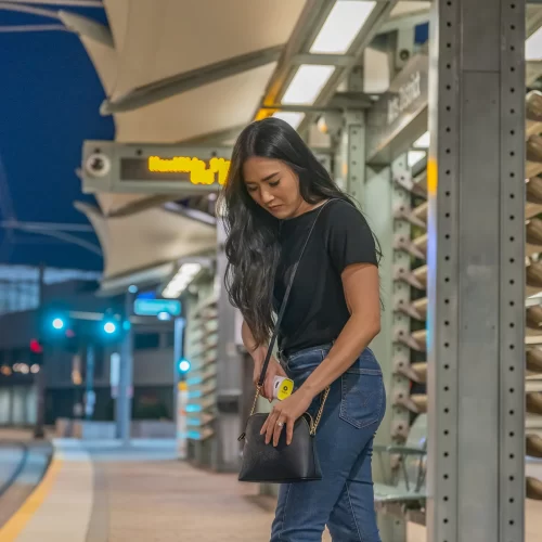 Asian woman subway platform 100068taserbolt211