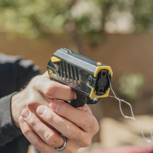 ThugBusters TASER Pulse in hand