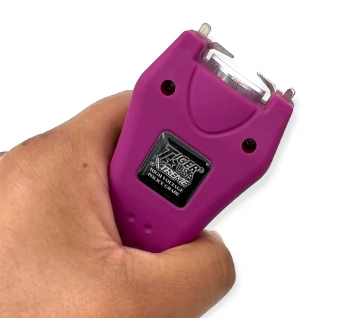 Mighty Warrior Stun Gun in hand Deep purple