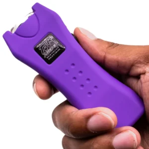 Mighty Warrior Stun Gun in hand-Purple