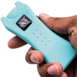 Mighty Warrior Stun Gun in hand-Teal